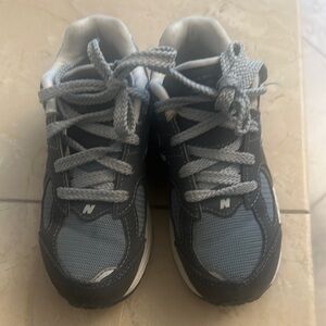 New Balance Blue and Black Sneakers with Durable Design